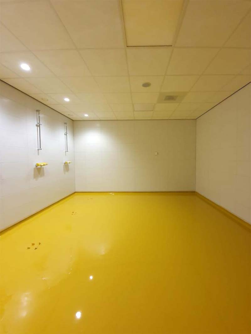 Yellow commercial high build epoxy floor installed by Burgh Resin