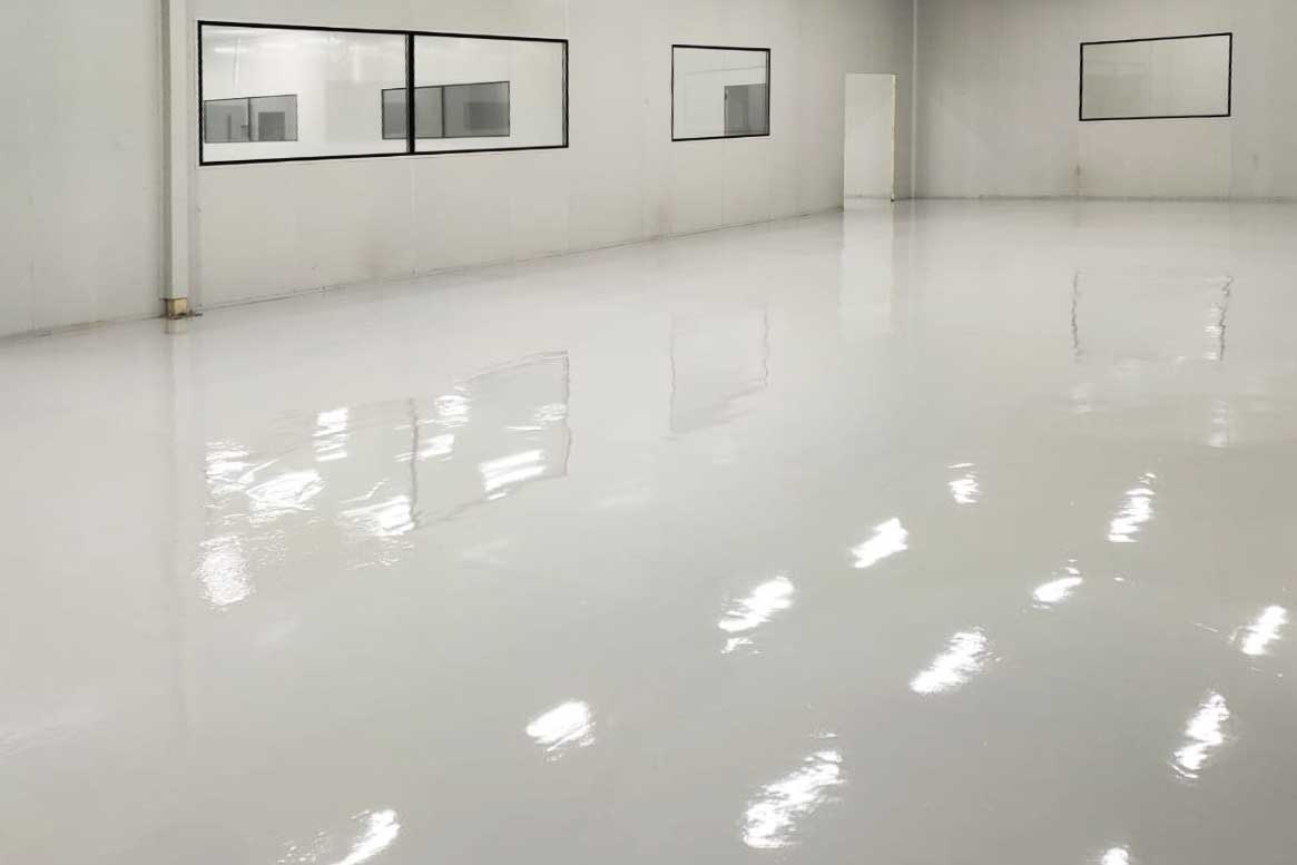 White high build epoxy flooring installed by Burgh Resin in a glasgow premises