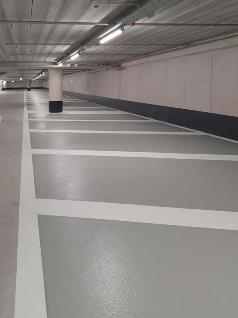 Grey car park high build epoxy flooring installation by Burgh Resin, Scotland